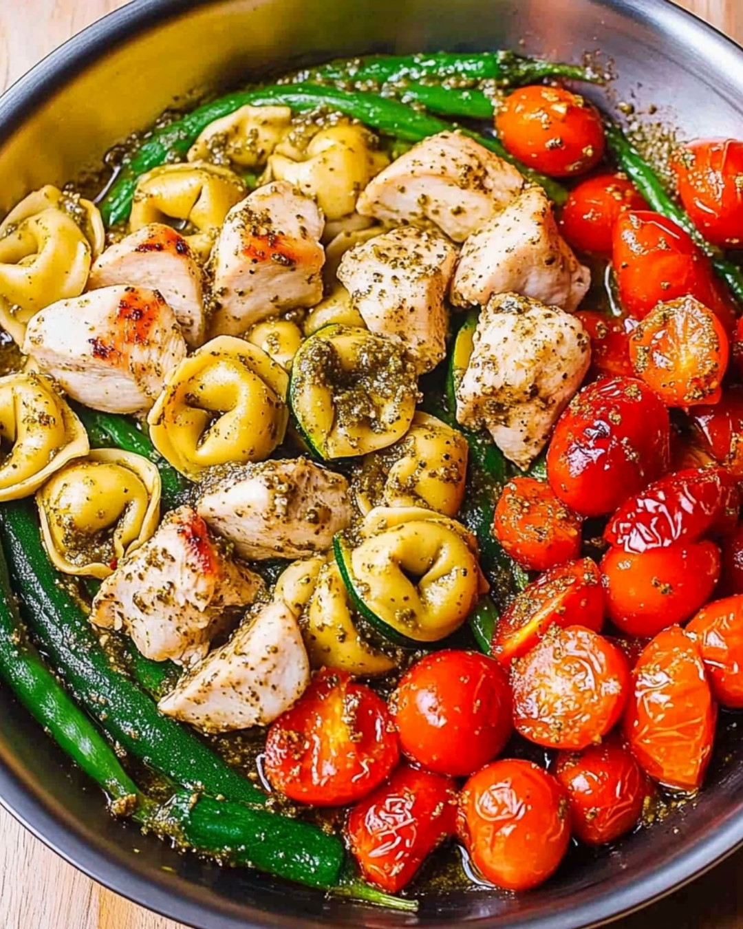 Delicious-One-Pan-Pesto-Chicken-Tortellini-and-Veggies.webp